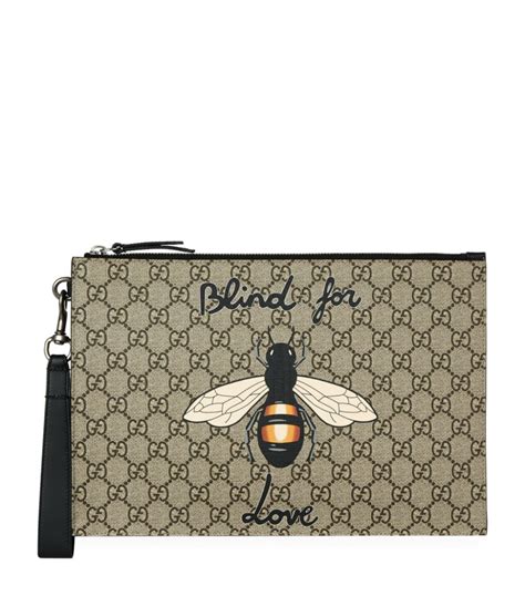 gucci supreme bee key case|Gucci key pouch with hook.